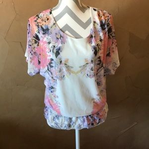 Maurices Blouse with floral design.